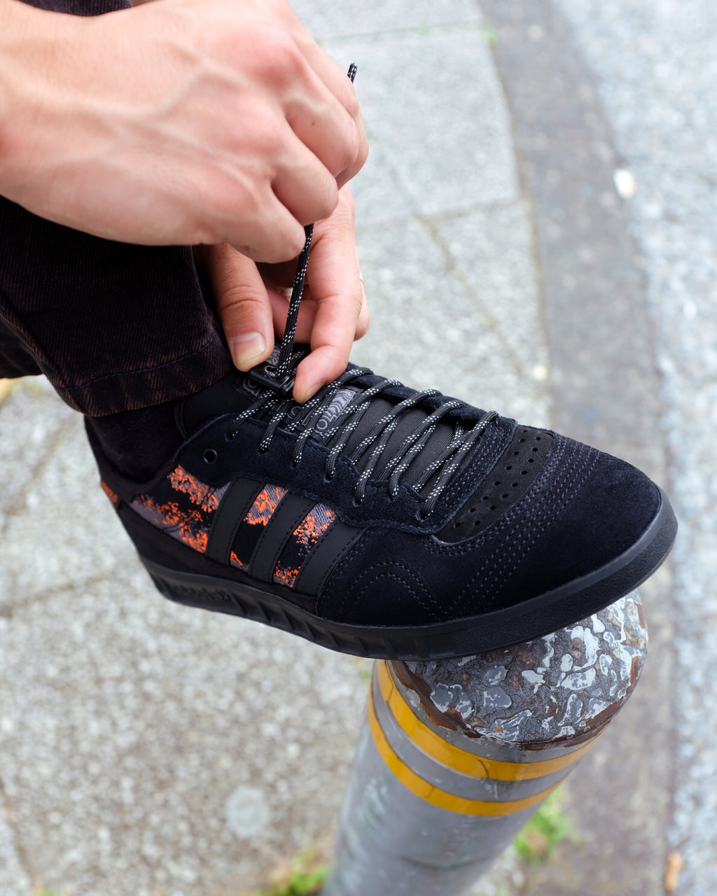 ADIDAS SKATEBOARDING - Handball Top x Mike Arnold "Core Black/Semi Impact Orange"