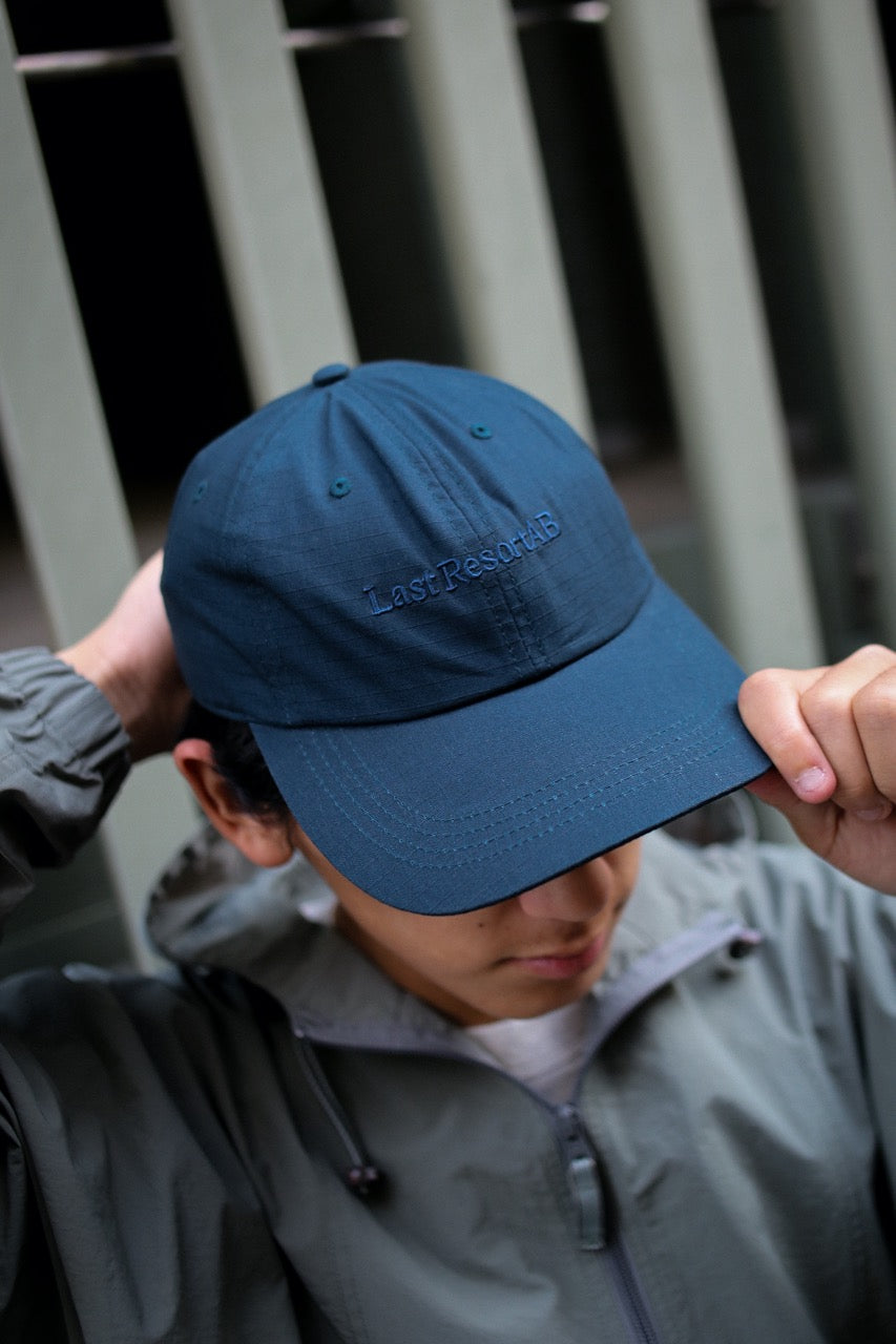 Last Resort AB - Soft Peak Cap-Script Logo "Deep Blue"